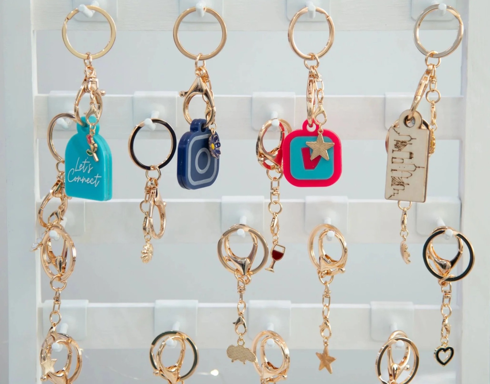 Custom branded NFC keychains on a display wall